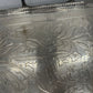 Exceptional footed silver tray with wooden serving handles and bird and floral engraving scene